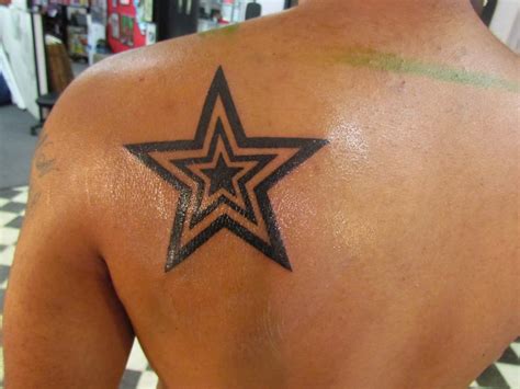 star tattoo designs male|body art star tattoos.